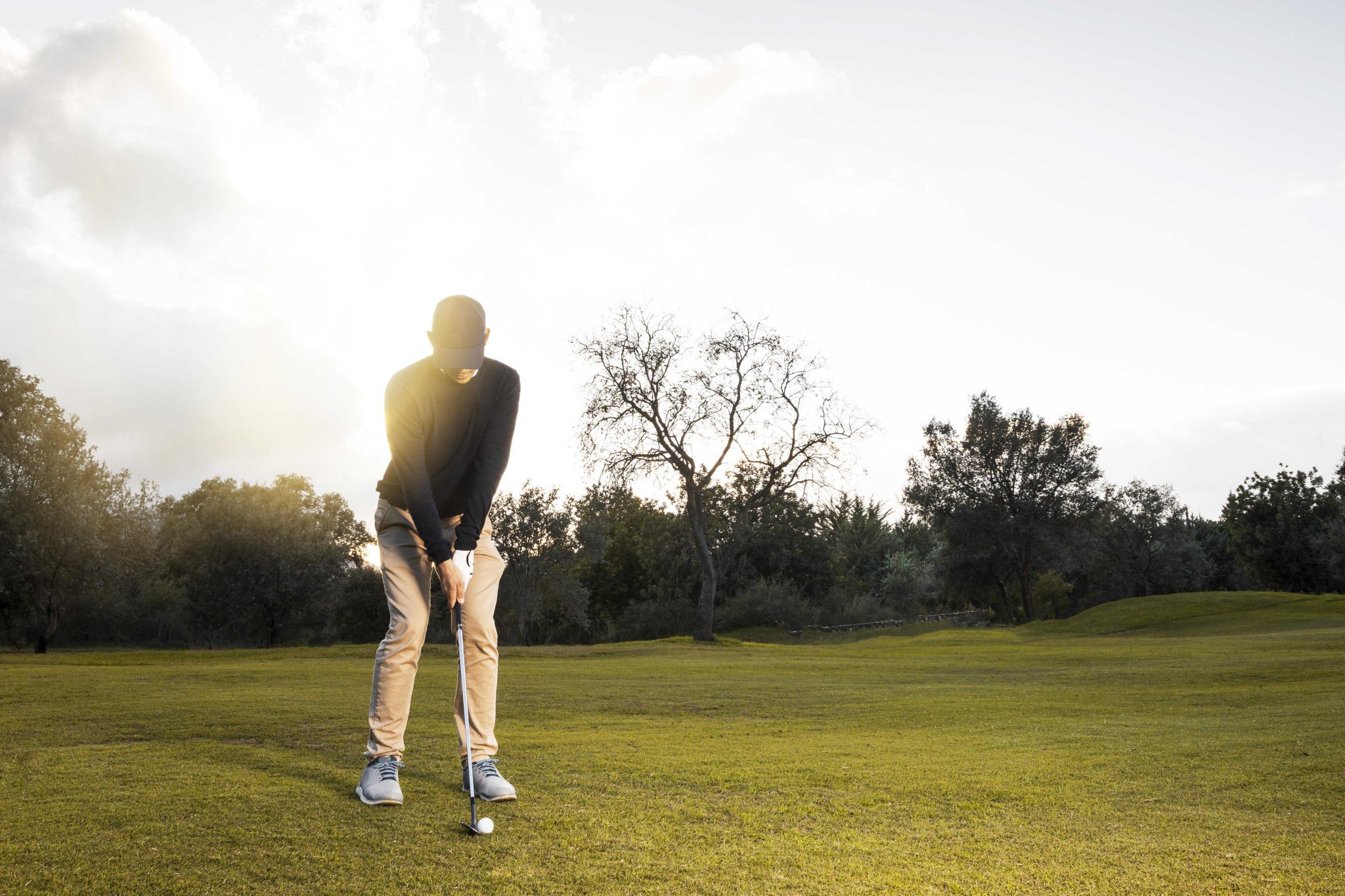 front-view-of-man-on-the-grassy-golf-field.jpg